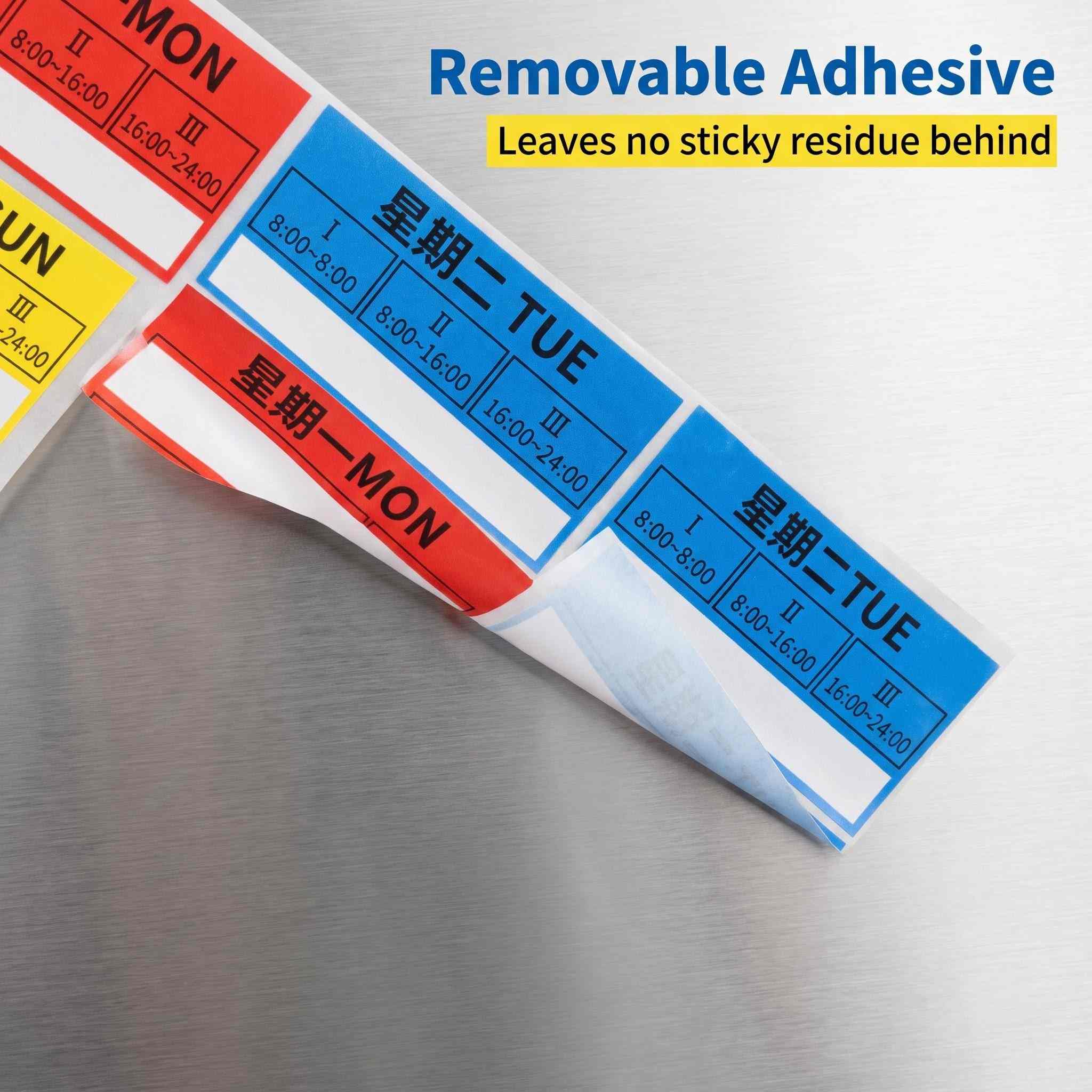 Removable day-of-the-week label peeling off cleanly without adhesive residue